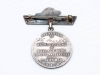 Sterling silver “welcome home” medal presented by the town of Wallaceburg to those who had served in WW I (it was also given to the next of kin of those who were killed). This medal was awarded to H. Murphy. (Back)