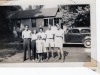 2 Men in Military Hats Standing with Others