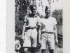 2 Men in Shorts and Tshirts with Military Hat