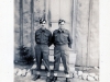 2 Uniformed Soldiers in front of Closed Door