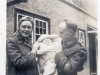 Man in Uniform with Baby and a Woman