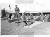 Soldier with Machine Gun and Others Behind Him