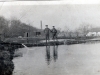 2 Soldiers Standing by Water