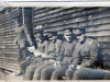 5 Sitting with One Standing at Doorway WWI